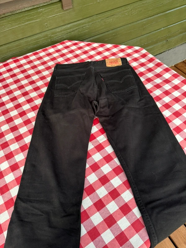 Black button jeans