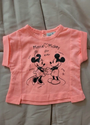 Maglietta mezza manica color pesca da neonata., merk: Disney, staat: Heel goed, maat: Tot 1 maand / 50 cm, € 2,00, € 2,80 inclusief Kopersbescherming