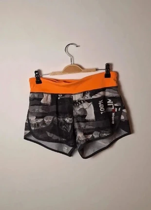 Short Reebok taille XS noir à motifs et orange avec poche intérieure et culotte intégrée, marque: Reebok, état: Très bon état, taille: XS / 34 / 6, 10,00 €, 11,20 € Protection acheteurs (Pro) incluse