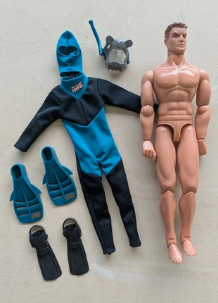 Jongenspop met duikkleding, merk: Lanard, staat: Heel goed, maat: Universeel, € 3,00, € 3,85 inclusief Kopersbescherming