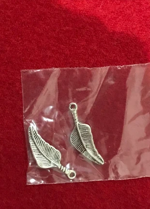 Feather charms, condition: New without tags, £1.00, £1.75 includes Buyer Protection
