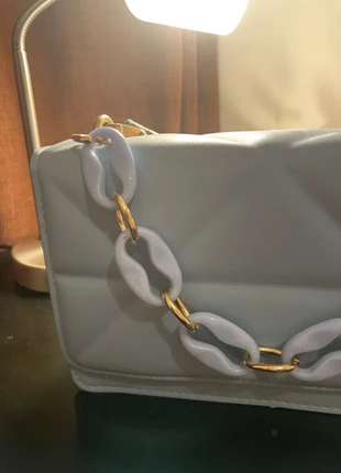 Light blue and gold textured bag with a light blue and golden patterned strap, condition: New without tags, €6.00, €7.00 includes Buyer Protection