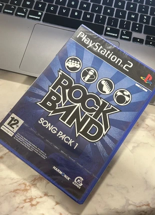 Jeu PlayStation 2 – PS2 – Rock Band Song Pack 1 – Neuf sous blister – Jamais ouvert, zustand: Neu, mit Etikett, 5,00 €, 5,95 € inklusive Vinted-Käuferschutz