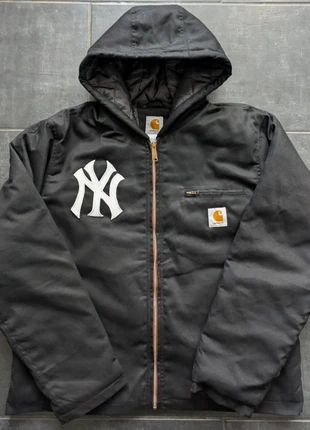 The 2025 embroidered active reworked jacket in black, brand: Carhartt, condizioni: Nuovo senza cartellino, taglia: M, €99.00, €104.65 include la Protezione acquisti Pro