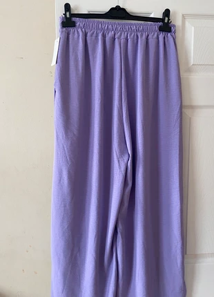 Lilac flared long trousers with pockets, brand: Italy Moda, condition: New with tags, size: One size, £10.00, £11.20 includes Buyer Protection