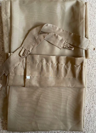 Coffee coloured pair of voiles, brand: Dunelm, condition: Very good, size: 150 cm - 199 cm, £2.50, £3.33 includes Buyer Protection