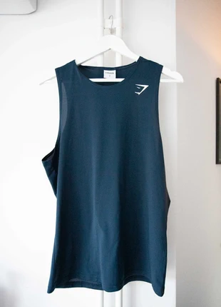 Donkerblauwe tanktop Gymshark maat S, merk: Gymshark, staat: Heel goed, maat: S, € 15,00, € 16,45 inclusief Kopersbescherming