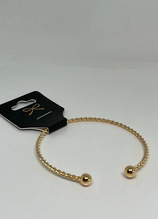 Goudkleurige bangle armband, merk: Uitverkoop, staat: Heel goed, € 1,00, € 1,75 inclusief Kopersbescherming Pro