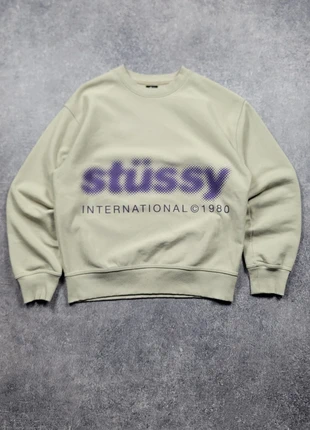 Pull col rond crewneck Stussy | Taille S | Beige print violet, marke: Stüssy, zustand: Sehr gut, größe: S, 65,00 €, 68,95 € inklusive Vinted-Käuferschutz