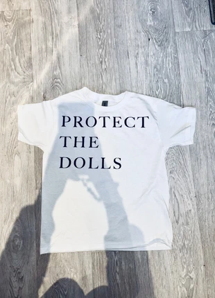 Protect The Dolls Slogan Baby Tee, women’s slogan cropped top, brand: CherryThreadsCo, condition: New with tags, size: L / 12, £9.99, £11.19 includes Buyer Protection Pro