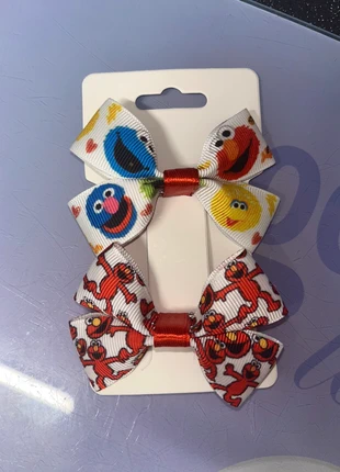 Elmo Sesame Street hair bows, brand: Sesame Street, condition: Very good, £2.00, £2.46 includes Buyer Protection