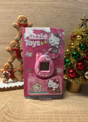 Tamagotchi hello kitty, marque: Hello Kitty, état: Très bon état, taille: 3 ans / 98 cm, 6,90 €, 7,95 € Protection acheteurs (Pro) incluse