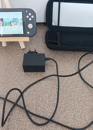 🎮 Nintendo Switch Lite + Chargeur + Housse de transport, marke: Nintendo, zustand: Sehr gut, 87,64 €, 92,72 € inklusive Vinted-Käuferschutz