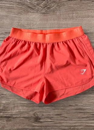 Short Gymshark Orange - Très bon état - Taille XL, brand: Gymshark, condizioni: Ottime, taglia: XL / IT 46 / EU 42, €14.99, €16.44 include la Protezione acquisti Pro