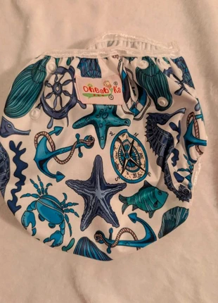 Lot de 2 couches lavables / d’apprentissage – OhBabyKa + modèle sans marque – Très bon état, brand: Ohbabyka, condizioni: Nuovo con cartellino, taglia: 4–9 kg, €7.00, €8.05 include la Protezione acquisti