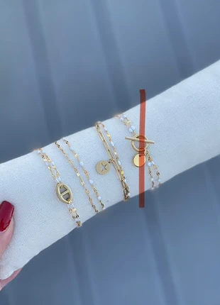 Bracelet blanc et doré en acier inoxydable (vendu à l’unité), brand: Tendance, condition: Very good, €9.00, €10.15 includes Buyer Protection Pro