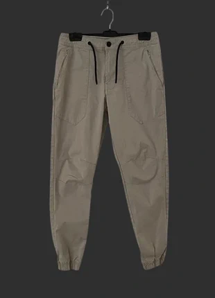 Pantalones color beige jogger con elásticos en los tobillos de Denim Co (H-00068), marca: Denim Co, estado: Muito bom, tamanho: S, €5.00, €5.95 inclui Proteção do Comprador