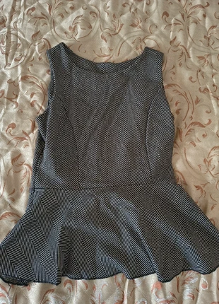 Top con peplo grigio rescato M/L, condizioni: Ottime, taglia: M / IT 42 / EU 38, €6.00, €7.00 include la Protezione acquisti