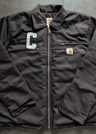 The 2025 Carhartt detroit rework jacket in black, brand: Carhartt, condizioni: Nuovo senza cartellino, taglia: XL, €99.00, €104.65 include la Protezione acquisti Pro