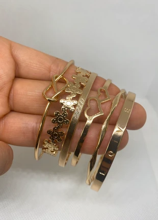 Chic Gold Tone 6-Piece Stackable Bangle Bracelet Set with Charms (Love, Heart, Flower, Knot), brand: Oliver Bonas, condition: Very good, £10.90, £12.15 includes Buyer Protection Pro