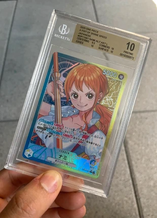 Nami (OP11-041) BGS 10 Gold, marke: OnePiece, zustand: Neu, 79,99 €, 84,69 € inklusive Vinted-Käuferschutz