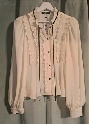 Chemisier écru à volants - TL, marke: Linú par CLP, zustand: Neu, mit Etikett, größe: L / 40 / 12, 13,50 €, 14,88 € inklusive Vinted-Käuferschutz