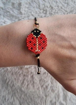 Bracelet Coccinelle taille réglable, marque: Crystalia Perles, état: Neuf sans étiquette, 10,00 €, 11,20 € Protection acheteurs incluse