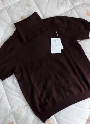 Maglioncino a collo alto a maniche corte, staat: Nieuw met prijskaartje, maat: Universele maat, € 6,00, € 7,00 inclusief Kopersbescherming