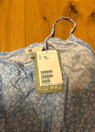 neuer blumiger Jumpsuit für Kinder  von H&M, brand: H&M, condizioni: Nuovo con cartellino, taglia: 14 anni / 164 cm, €10.00, €11.20 include la Protezione acquisti