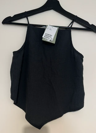 Antraciet straptop maat 158 (nieuw), marque: H&M, état: Neuf avec étiquette, taille: 13 ans / 158 cm, 3,00 €, 3,85 € Protection acheteurs incluse