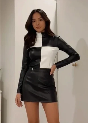 Haut simili cuir noir & blanc, col montant, taille L, marque: Vintage Dressing, état: Très bon état, taille: L / 40 / 12, 45,00 €, 47,95 € Protection acheteurs incluse