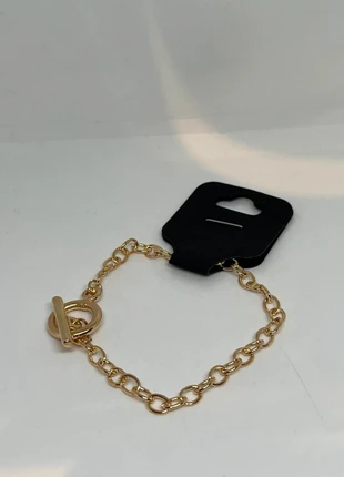 Goudkleurige armband, merk: Uitverkoop, staat: Heel goed, € 1,00, € 1,75 inclusief Kopersbescherming Pro