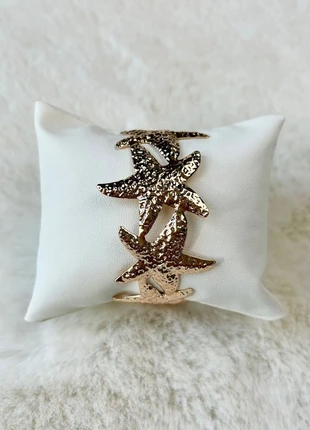 Bijoux femme, bracelet jonc étoile de mer doré en acier inoxydable et ajustable, brand: Le Marché, condition: Very good, €9.90, €11.10 includes Buyer Protection Pro