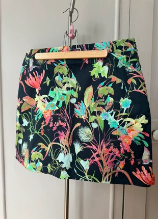 Jupe de golf Nuni fleuris, marca: NUNI, estado: Muito bom, tamanho: XL / 42 / 14, €30.00, €32.20 inclui Proteção do Comprador