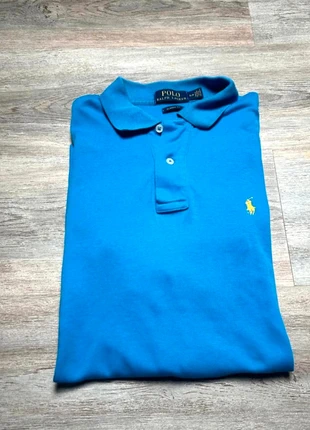 Polo manche courte Ralph Lauren couleur bleu logo jaune taille S en très bon état, marke: Ralph Lauren, zustand: Sehr gut, größe: S, 19,99 €, 21,69 € beinhaltet Vinted-Käuferschutz Pro
