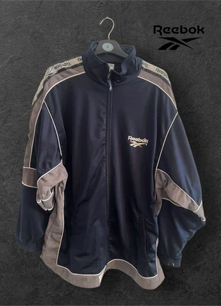 Vintage Reebok Windbreaker Jacket | Retro Sportswear | Classic Track Jacket |, marca: Reebok, estado: Muito bom, tamanho: XL, €32.00, €34.30 inclui Proteção do Comprador