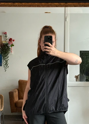 Running vest, staat: Heel goed, € 6,00, € 7,00 inclusief Kopersbescherming