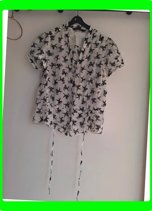 Blouse 190 Zara motif cupidon blanc et noir, marque: Zara, état: Très bon état, taille: L / 40 / 12, 7,00 €, 8,05 € Protection acheteurs (Pro) incluse