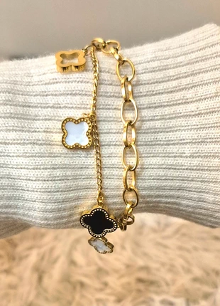 Jolie bracelet en acier trèfle noir et blanc et dorée, marque: Tendance, état: Très bon état, 14,00 €, 15,40 € Protection acheteurs incluse