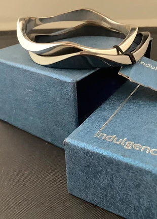 Two bangles that interconnect by Indulgence new and boxed, brand: Indulgence, condition: New with tags, size: 26 inches, £2.50, £3.33 includes Buyer Protection