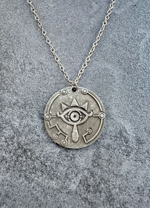 Collier Œil Sheikah argenté Zelda Breath of the Wild Médaillon gamer cosplay, marca: Zelda, estado: Muy bueno, 9,99 €, 11,19 € Protección al comprador Pro incluida