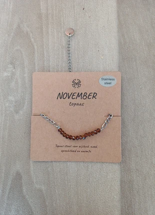 November armband topaas, merk: topaas, staat: Nieuw met prijskaartje, € 2,50, € 3,33 inclusief Kopersbescherming