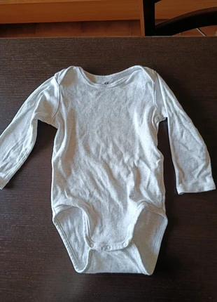 Body bianco neonato, marque: H&M, état: Très bon état, taille: 9-12 mois / 74 cm, 4,00 €, 4,90 € Protection acheteurs incluse