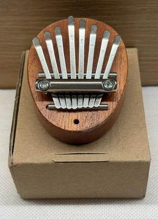 Mini Kalimba portable bois massif et acier, condizioni: Nuovo con cartellino, €9.90, €11.10 include la Protezione acquisti Pro