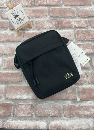 Sacoche Lacoste Neocroc noire (Camera Bag), marque: Lacoste, état: Neuf avec étiquette, 50,00 €, 53,20 € Protection acheteurs (Pro) incluse