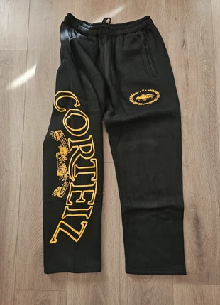 Pantalon Corteiz Negro y Dorado, marque: Corteiz, état: Neuf avec étiquette, taille: M, 39,99 €, 42,69 € Protection acheteurs incluse