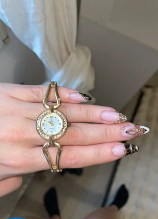 Montre dorée, marque: Le Marché, état: Très bon état, taille: Taille unique, 5,00 €, 5,95 € Protection acheteurs incluse