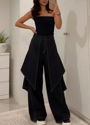 Pantalon noir oversize asymétrique à surpiqûres contrastées taille M, brand: . TYLA, condition: Very good, size: M / 38 / 10, €59.00, €62.65 includes Buyer Protection