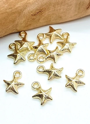 Lot de 10 breloques étoiles dorées en acrylique (BRE-37), marca: Breloques, estado: Muito bom, €1.00, €1.75 inclui Proteção do Comprador Pro