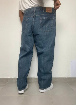 Jean Levi’s 550 homme W42 L30 coupe large relaxed couleur bleu 100% coton (477), marque: Levi's, état: Très bon état, taille: W42 | FR 52, 29,99 €, 32,19 € Protection acheteurs (Pro) incluse